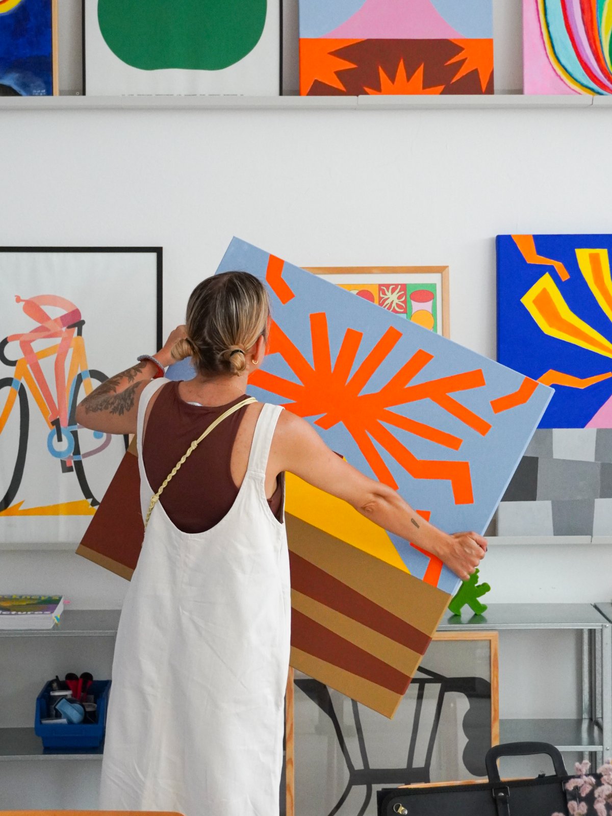 Moving a painting in the studio